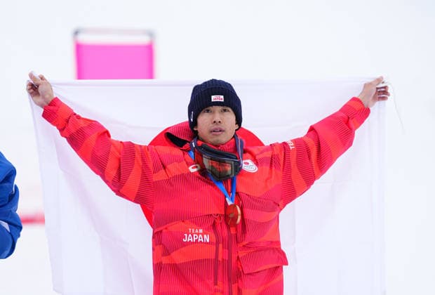 February 12, 2026, Livigno, Aarhus, Italy: IKUMA HORISHIMA celebrates winning bronze during the Men s Moguls finals, Milano Cortina 2026 Winter Olympic Games, Olympische Spiele, Olympia, OS at Livigno Air Park Livigno Italy - ZUMAp228 20260212_zsp_p228_002 Copyright: xUlrikxPedersenx