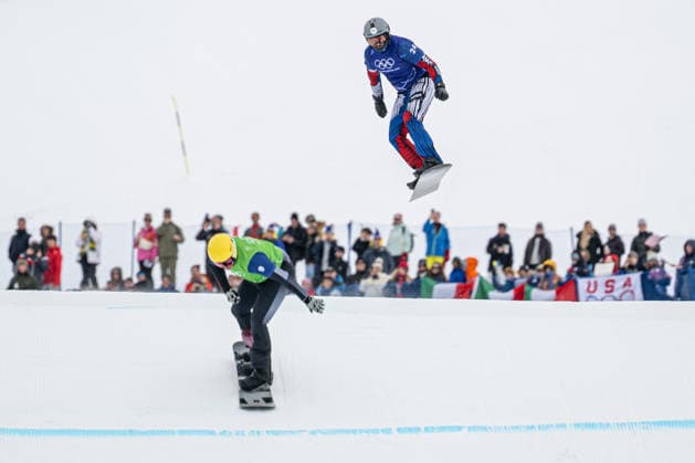 XXV Winter Olympic Games, Olympische Spiele, Olympia, OS in Livigno, Italy, on February 12, 2026. Snowboard Men s Snowboard Cross 1 8 Finals. From left: Jakob Dusek of Austria and Krystof Choura of the Czech Republic. (CTKxPhoto DavidxTanecek) CTKPhotoP2026021207016  CTKPhotoP2026021207016