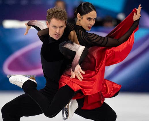 February 11, 2026, Milan, Italy: MADISON CHOCK and EVAN BATES (USA) taking the silver medal with this performance in Figure skating, Eiskunstlauf ice dance free dance at the Milano Cortina 2026 Olympics. Milan Italy - ZUMAa35_ 20260212_oly_a35_026 Copyright: xDanielxA.xAndersonx