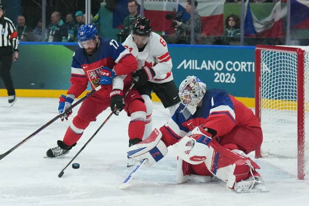 February 12, 2026, Milan, ITALY: Filip Hronek (17) of Team Czechia and Mark Stone (61) of Team Canada battle for the puck as Lukas Dostal (1) of Team Czechia makes a save during first period men s Olympic hockey action at the 2026 Milan Cortina Winter Olympics in Milan, Italy on Thursday, February 12, 2026. Canada News - February 12, 2026  - ZUMAc35_ 20260212_zaf_c35_086 Copyright: xNathanxDenettex