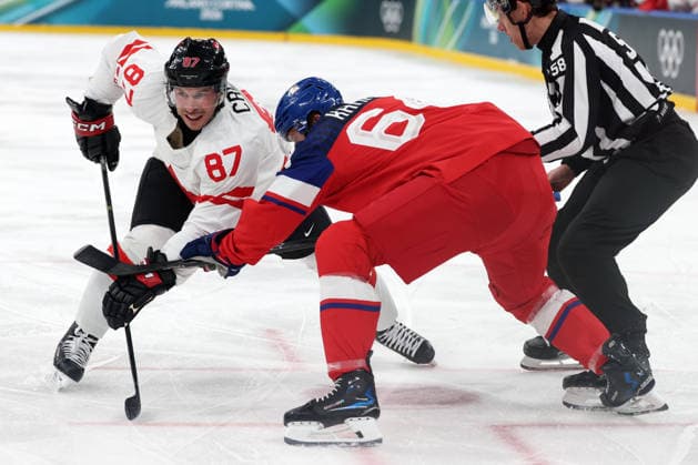 Milano Cortina 2026, Milan, Italy, 12.02, 2026, MiCo2026, MiCo, 2026, Olympics, Olympic, Winter Olympic, Olympic Winter games, Winterspiele,Spiele, Summer games Ice hockey, Eishockey Canada, Czechia Sidney Crosby of Canada and David Kampf of Czechia in action during men™s Premilinary round Group A Ice Hockey match between Canada and Czechia teams of Milano Cortina 2026 Olympic Winter Games in Milan, Italy, 12.02.2026. Photo: Roman Koksarov (RKF) Milan Italy Copyright: xRomanxKoksarovx 0B4A1212.JPG