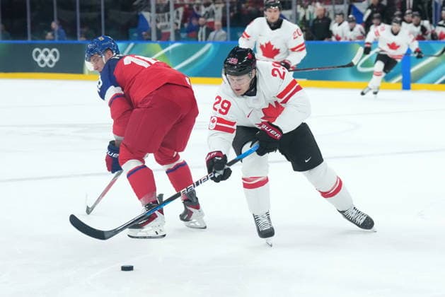 February 12, 2026, Milan, ITALY: Nathan MacKinnon (29) of Team Canada skates around Ondrej Palat (18) of Team Czechia during first period men s Olympic hockey action at the 2026 Milan Cortina Winter Olympics in Milan, Italy on Thursday, February 12, 2026. Canada News - February 12, 2026  - ZUMAc35_ 20260212_zaf_c35_108 Copyright: xNathanxDenettex