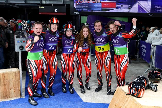 OLYMPICS - Winter Olympic Games, Olympische Spiele, Olympia, OS Milano Cortina 2026 CORTINA D AMPEZZO,ITALY,12.FEB.26 - OLYMPICS, LUGE - Winter Olympic Games Milano Cortina 2026, team relay. Image shows the rejoicing of Wolfgang Kindl, Selina Egle, Lara Michaela Kipp, Lisa Schulte, Jonas Mueller and Thomas Steu (AUT).  GEPAxpictures xMaticxKlansek