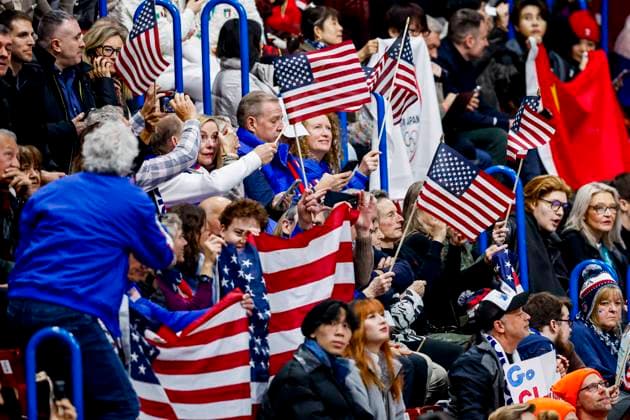 supporters of United States of America looks on while watching atheletes Women s 500m Quarterfinals, Milano Cortina 2026 Winter Olympics: Day 6, Short Track Speed skating, Eisschnelllauf - Milano Cortina 2026 Winter Olympics: Day 6, Milano Speed Skating Stadium, February 12, 2026, Milan, Italy.