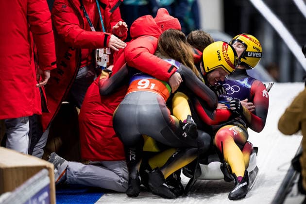 CORTINA, ITALY - FEBRUARY 12: Julia Taubitz (Germany), Tobias Wendl Tobias Arlt (Germany), Max Langenhan (Germany), Dajana Eitberger Magdalena Matschina (Germany) hug after winning Gold during the Luge Team Relay at the Milano Cortina 2026 Olympics at Cortina Sliding Centre on day 6 of the Milano Cortina 2026 Olympics on February 12, 2026 in Cortina, Italy. Editorial use only. Italy Copyright: xSteffiexWunderlx