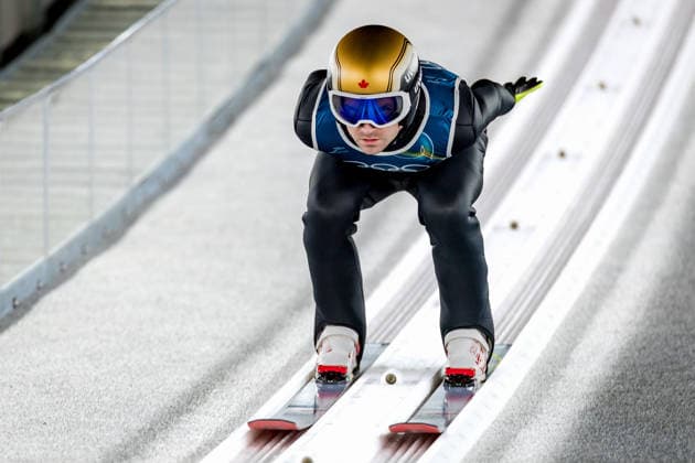 OLYMPICS - Winter Olympic Games, Olympische Spiele, Olympia, OS Milano Cortina 2026 PREDAZZO,ITALY,12.FEB.26 - OLYMPICS, NORDIC SKIING, Ski jumping, Skispringen, Ski, nordisch - Winter Olympic Games Milano Cortina 2026, large hill, men, training. Image shows Mackenzie Boyd-Clowes (CAN).  GEPAxpictures xMatthiasxTrinkl