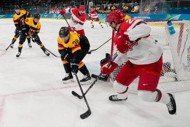 Fabio Wagner (Germany) und Oliver Bjorkstrand (Denmark) battle for the puck during the Ice hockey, Eishockey Men - Preliminary Round - Group C match between Germany v Denmark on day six of the Milano Cortina 2026 Winter Olympic Games, Olympische Spiele, Olympia, OS at Milano Rho Ice Hockey Arena on February 12, 2026 in Milan, Italy. (Photo by Alex Gottschalk DeFodi Images) - *** Fabio Wagner Germany and Oliver Bjorkstrand Denmark battle for the puck during the Ice Hockey Men Preliminary Round Group C match between Germany v Denmark on day six of the Milano Cortina 2026 Winter Olympic games at Milano Rho Ice Hockey Arena on February 12, 2026 in Milan, Italy Photo by Alex Gottschalk DeFodi Images