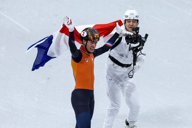 Jens van T Wout (NED) happiness with the netherlands flag after winning the gold medal at the end of the Olympic Winter games, Winterspiele,Spiele, Summer games Milano-Cortina 2026, Short Track Speed skating, Eisschnelllauf Men s 1000m Finals on February 12, 2026 at Milano Ice Skating Arena in Milan, Italy  Copyright: xFabrizioxCarabelli IPAxSportx xipa-agency.netx xx IPA_71396711 IPA_Agency_IPA71396711