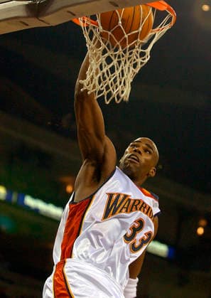Dec 30, 2002; Oakland, CA, USA; Golden State Warriors Antawn Jamison dunks a basket against the Phoenix Suns at The Arena in Oakland, Calif. on Saturday November 30, 2002. Jamison scored 37 points as the Warriors beat the Suns 100-90. Oakland CA USA Copyright: xEddiexLedesma ContraxCostaxTimesx