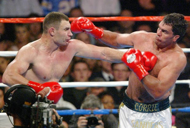 Apr 24, 2004; Los Angeles, CA, USA; Boxer VITALI KLITSCHKO (L) battles with CORRIE SANDERS during their WBC heavyweight title fight at the Staple Center. Klitschko went on to win by TKO to claim the championship. Los Angeles CA USA Copyright: xJ.P.xYimx