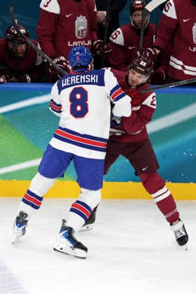 Milano Cortina 2026, Milan, Italy, 12.02, 2026, MiCo2026, MiCo, 2026, Olympics, Olympic, Winter Olympic, Olympic Winter games, Winterspiele,Spiele, Summer games Ice hockey, Eishockey Latvia, USA, United States Zach Werenski of United States and Teodors Blugers of Latvia in action during men™s Premilinary round Group C Ice Hockey match between Latvia and USA teams of Milano Cortina 2026 Olympic Winter Games in Milan, Italy, 12.02.2026. Photo: Roman Koksarov (RKF) Milan Italy Copyright: xRomanxKoksarovx 0B4A2103.JPG