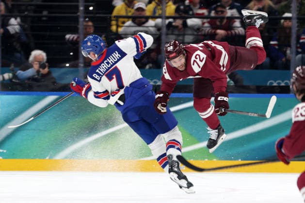 Milano Cortina 2026, Milan, Italy, 12.02, 2026, MiCo2026, MiCo, 2026, Olympics, Olympic, Winter Olympic, Olympic Winter games, Winterspiele,Spiele, Summer games Ice hockey, Eishockey Latvia, USA, United States Janis Jaks of Latvia and Brady Tkachuk of United States in action during men™s Premilinary round Group C Ice Hockey match between Latvia and USA teams of Milano Cortina 2026 Olympic Winter Games in Milan, Italy, 12.02.2026. Photo: Roman Koksarov (RKF) Milan Italy Copyright: xRomanxKoksarovx 0B4A2776.JPG