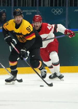 Milano Cortina, 2026 , Winter Olympic Games, Olympische Spiele, Olympia, OS Olympische Winter-Olympische spiele 2026 , Icehockey, Eishockey Männer, Men s Preliminary Round, Vorrunde, Deutschland vs Dänemark, Germany vs Denmark , ce Hockey Arena Milano Mailand Moritz Müller, Mueller, Deutschland, Germany, Nicolas Jensen DEN Photocopyright Gladys Chai von der Laage *** Milano Cortina, 2026 , Winter Olympic Games, Winter Olympic Games 2026 , Icehockey, Icehockey Men, Men s Preliminary Round, Preliminary Round, Germany vs Denmark, Germany vs Denmark , ce Hockey Arena Milano Milano Moritz Müller, Mueller, Germany, Germany, Nicolas Jensen DEN Photocopyright Gladys Chai von der Laage