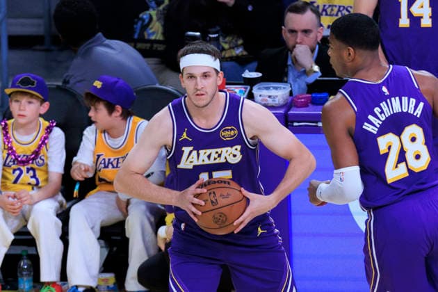 February 12, 2026, Los Angeles, California, USA: Austin Reaves 15 of the Los Angeles Lakers receives the ball from Rui Hachimura 28 during their regular season NBA, Basketball Herren, USA game against the Dallas Mavericks on Thursday February 12, 2026 at Crypto.com Arena in Los Angeles, California. ARIANA RUIZ PI Los Angeles USA - ZUMAp124 20260212_zaa_p124_046 Copyright: xArianaxRuizx