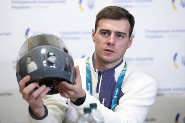 Milan Cortina Olympics: Disqualified Ukrainian athlete Ukrainian skeleton racer Vladyslav Heraskevych meets the press in Milan on Feb. 12, 2026, after he was disqualified from the Milan Cortina Olympics for refusing to give up his plan to race in a helmet commemorating athletes killed since Russia s invasion.  A14AA0005277714P