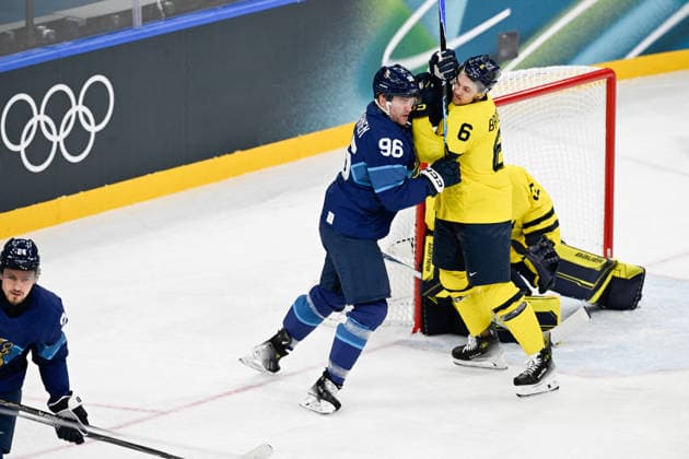Winter Olympics - Men Ice hockey, Eishockey - Finland v Sweden Mikko Rantanen 96 of Team Finland and Philip Broberg 6 of Team Sweden during the Men s Preliminary Group B match between Finland and Sweden on day seven of the Milano Cortina 2026 Winter Olympic Games, Olympische Spiele, Olympia, OS at Milano Santagiulia Ice Hockey Arena on February 13, 2026 in Milan, Italy. Photo by JMP ABACAPRESS.COM Milan Italy  Copyright: xJMP ABACAx
