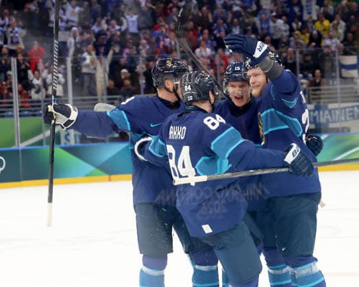 February 13, 2026, Milan, Lombardy, Italy: Nikolas Matinpalo 33 of Team Finland and teammates celebrate a goal over Team Sweden during a Group B men s Ice hockey, Eishockey game during the Milano Cortina 2026 Olympic Winter games, Winterspiele,Spiele, Summer games at Milano Santagiulia Ice Hockey Arena Milan Italy - ZUMAm117 20260213_oly_m117_002 Copyright: xDavidxMcIntyrex