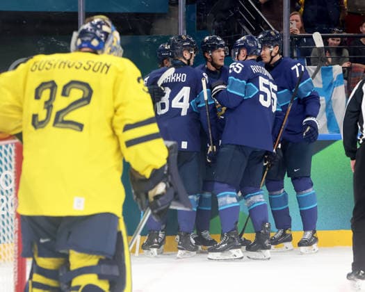 February 13, 2026, Milan, Lombardy, Italy: Anton Lundell 15 of Team Finland and teammates celebrate a goal over Team Sweden during a Group B men s Ice hockey, Eishockey game during the Milano Cortina 2026 Olympic Winter games, Winterspiele,Spiele, Summer games at Milano Santagiulia Ice Hockey Arena Milan Italy - ZUMAm117 20260213_oly_m117_004 Copyright: xDavidxMcIntyrex