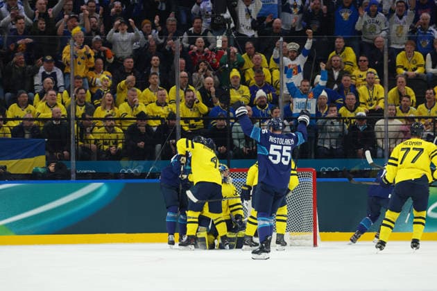 February 13, 2026, Milan, Lombardy, Italy: ANTON LUNDELL 13 of Finland celebrates scoring his side s second goal assisted by Eetu Luostarinen in the Preliminary Round Group B game between Team Finland and Team Sweden at the Milano Cortina 2026 Olympic Games, Olympische Spiele, Olympia, OS Olympics 2026: Milano Cortina: Ice hockey, Eishockey Men: FIN:SWE  - ZUMAc179 20260213_oly_c179_045 Copyright: xMickaelxChavetx