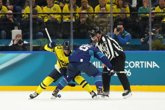 February 13, 2026, Milan, Lombardy, Italy: Face-off during the Preliminary Round Group B game between Team Finland and Team Sweden at the Milano Cortina 2026 Olympic Games, Olympische Spiele, Olympia, OS Milan Italy - ZUMAc179 20260213_oly_c179_048 Copyright: xMickaelxChavetx