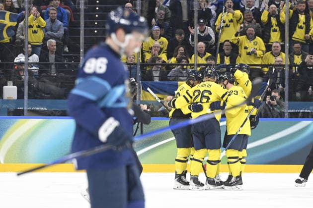 MILAN, ITALY 20260213 Sweden s Rasmus Dahlin (26) celebrates with teammates after reducing the score to 2-1 during the Ice hockey, Eishockey match in Group B between Sweden and Finland at the Santagiulia Arena during the Milan Olympics. *** The image is included in the SPORTS PACKAGE. For others PAID IMAGE *** MILANO ITALY x10070x *** MILAN, ITALY 20260213 Sweden s Rasmus Dahlin 26 celebrates with teammates after reducing the score to 2 1 during the ice hockey match in Group B between Sweden and Finland at the Santagiulia Arena during the Milan Olympics The image is included in the SPORTS PACKAGE For others PAID IMAGE MILANO ITALY x10070x  Copyright: xJessicaxGow TTx OS 2026 ICE HOCKEY FINLAND-SWEDER