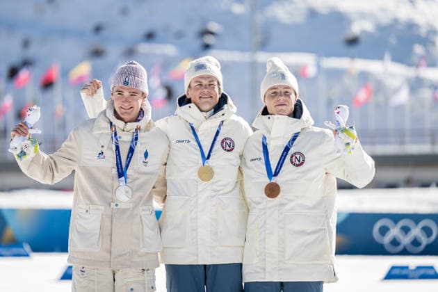 260213 Mathis Desloges of France, Johannes Hosflot Klaebo of Norway and Einar Hedegart of Norway celebrate on the podium after the men s 10km free technique individual start cross-country skiing race during day 7 of the 2026 Winter Olympics on February 13, 2026 in Val di Fiemme. Photo: Maxim Thore BILDBYRAN kod MT MT0976 skidor cross-country skiing langrenn Olympic Games, Olympische Spiele, Olympia, OS olympics winter olympics os ol olympiska spel vinter-os olympiske leker milano cortina 2026 milan cortina 2026 milano cortina 2026 olympic games milano cortina 2026 winter olympic games milano cortina-os milano cortina-ol vinter-ol 7 bbeng intervallstart norge frankrike jubel *** 260213 Mathis Desloges of France, Johannes Hosflot Klaebo of Norway and Einar Hedegart of Norway celebrate on the podium after the men s 10km free technique individual start cross country skiing race during day 7 of the 2026 Winter Olympics on February 13, 2026 in Val di Fiemme Photo Maxim Thore BILDBYRAN kod MT MT0976 skidor cross country skiing langrenn olympic games olympics winter olympics os ol olympiska spel vinter os olympiske leker milano cortina 2026 milan cortina 2026 milano cortina 2026 olympic games milano cortina 2026 winter olympic games milano cortina os milano cortina ol vinter ol 7 bbeng intervallstart norge france jubel  Copyright: MAXIMxTHORE BB260213MT110