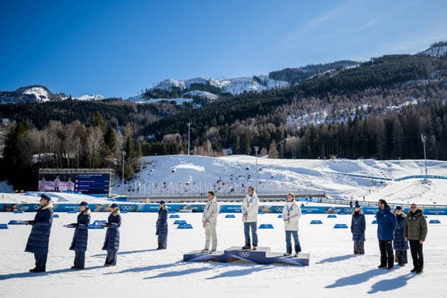 260213 Mathis Desloges of France, Johannes Hosflot Klaebo of Norway and Einar Hedegart of Norway celebrate on the podium after the men s 10km free technique individual start cross-country skiing race during day 7 of the 2026 Winter Olympics on February 13, 2026 in Val di Fiemme. Photo: Maxim Thore BILDBYRAN kod MT MT0976 skidor cross-country skiing langrenn Olympic Games, Olympische Spiele, Olympia, OS olympics winter olympics os ol olympiska spel vinter-os olympiske leker milano cortina 2026 milan cortina 2026 milano cortina 2026 olympic games milano cortina 2026 winter olympic games milano cortina-os milano cortina-ol vinter-ol 7 bbeng intervallstart norge frankrike jubel *** 260213 Mathis Desloges of France, Johannes Hosflot Klaebo of Norway and Einar Hedegart of Norway celebrate on the podium after the men s 10km free technique individual start cross country skiing race during day 7 of the 2026 Winter Olympics on February 13, 2026 in Val di Fiemme Photo Maxim Thore BILDBYRAN kod MT MT0976 skidor cross country skiing langrenn olympic games olympics winter olympics os ol olympiska spel vinter os olympiske leker milano cortina 2026 milan cortina 2026 milano cortina 2026 olympic games milano cortina 2026 winter olympic games milano cortina os milano cortina ol vinter ol 7 bbeng intervallstart norge france jubel  Copyright: MAXIMxTHORE BB260213MT111