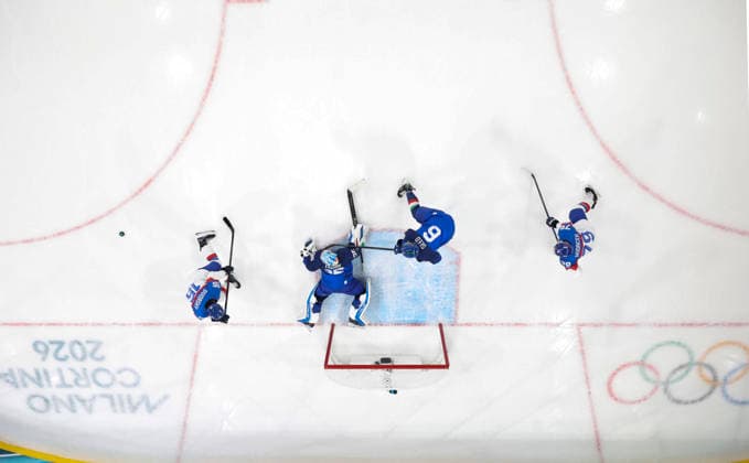(260213) -- MILAN, Feb. 13, 2026 -- Players of both teams compete during the Ice hockey, Eishockey men s preliminary round group B match between Italy and Slovakia at the Milan-Cortina 2026 Olympic Winter games, Winterspiele,Spiele, Summer games in Milan, Italy, Feb. 13, 2026. ) (MICO2026)ITALY-MILAN-OLYMPIC WINTER GAMES-ICE HOCKEY-MEN-PRELIMINARY-ITA VS SVK WangxKaiyan 
