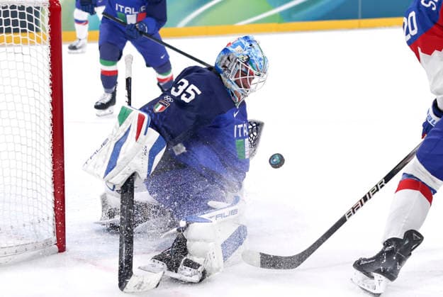 (260213) -- MILAN, Feb. 13, 2026 -- Davide Fadani, goalkeeper of Italy, makes a save during the Ice hockey, Eishockey men s preliminary round group B match between Italy and Slovakia at the Milan-Cortina 2026 Olympic Winter games, Winterspiele,Spiele, Summer games in Milan, Italy, Feb. 13, 2026. ) (MICO2026)ITALY-MILAN-OLYMPIC WINTER GAMES-ICE HOCKEY-MEN-PRELIMINARY-ITA VS SVK WangxKaiyan 