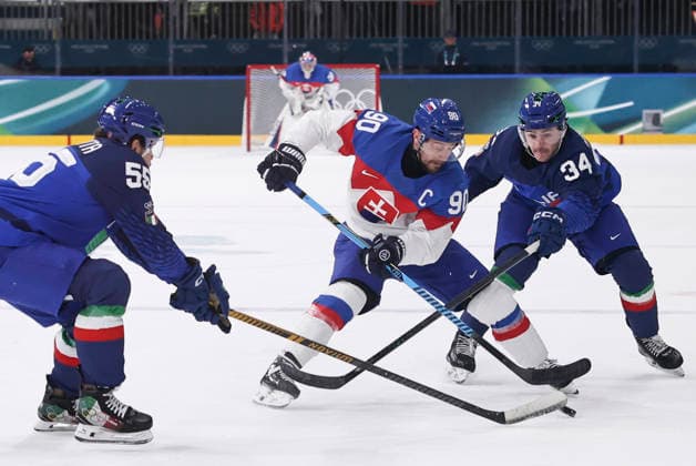 (260213) -- MILAN, Feb. 13, 2026 -- Tomas Tatar (C) of Slovakia vies with Tommy Purdeller (R) and Luca Zanatta of Italy during the Ice hockey, Eishockey men s preliminary round group B match between Italy and Slovakia at the Milan-Cortina 2026 Olympic Winter games, Winterspiele,Spiele, Summer games in Milan, Italy, Feb. 13, 2026. ) (MICO2026)ITALY-MILAN-OLYMPIC WINTER GAMES-ICE HOCKEY-MEN-PRELIMINARY-ITA VS SVK WangxKaiyan 