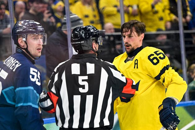MILAN, ITALY - FEBRUARY 13: Erik Karlsson of Sweden discuss with a referee after a fight with Rasmus Ristolainen of Finland during the Men™s Prelim Round match between Finland and Sweden on day seven of the Milano Cortina 2026 Winter Olympic Games, Olympische Spiele, Olympia, OS at Milano Santagiulia IHO Arena on February 13, 2026 in Milan, Italy. Milan Milano Santagiulia IHO Arena Italy *** MILAN, ITALY FEBRUARY 13 Erik Karlsson of Sweden discuss with a referee after a fight with Rasmus Ristolainen of Finland during the Men™s Prelim Round match between Finland and Sweden on day seven of the Milano Cortina 2026 Winter Olympic games at Milano Santagiulia IHO Arena on February 13, 2026 in Milan, Italy Milan Milano Santagiulia IHO Arena Italy Copyright: xJustPictures.ch AndreaxBrancax jp-en-EuSpIm-AB-AAB_233413022026