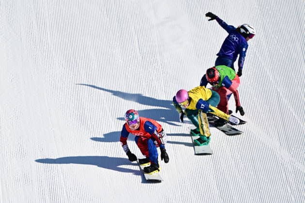 XXV Winter Olympic Games, Olympische Spiele, Olympia, OS in Livigno, Italy, on February 13, 2026. Snowboard Women s Snowboard Cross,Quarterfinals. L-R Eva Adamczykova of Czech Republic, Josie Baff of Australia, Sina Siegenthaler of Switzerland and Charlotte Bankes of Britain. (CTKxPhoto DavidxTanecek) CTKPhotoP2026021305601  CTKPhotoP2026021305601
