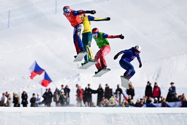 XXV Winter Olympic Games, Olympische Spiele, Olympia, OS in Livigno, Italy, on February 13, 2026. Snowboard Women s Snowboard Cross,Quarterfinals. L-R Eva Adamczykova of Czech Republic, Josie Baff of Australia, Sina Siegenthaler of Switzerland and Charlotte Bankes of Britain. (CTKxPhoto DavidxTanecek) CTKPhotoP2026021305627  CTKPhotoP2026021305627