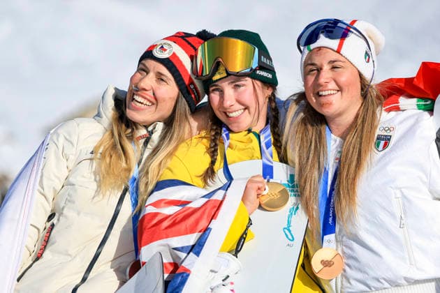 OLYMPICS - Winter Olympic Games, Olympische Spiele, Olympia, OS Milano Cortina 2026 LIVIGNO,ITALY,13.FEB.26 - OLYMPICS, SNOWBOARD - Winter Olympic Games Milano Cortina 2026, Snowboard Cross, women, final, medal ceremony. Image shows the rejoicing of Eva Adamczykova (CZE), Josie Baff (AUS) and Michela Moioli (ITA). Keywords: medal.  GEPAxpictures xWolfgangxGrebien