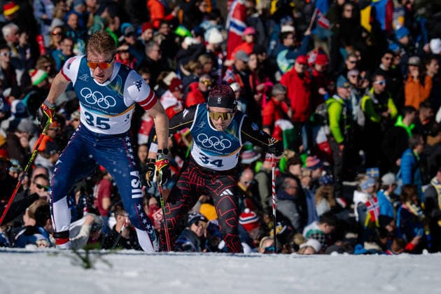 Zak Ketterson ( USA ) and Janosch Brugger ( Deutschland ) r., competes in the Men s 10 km Interval Start Freestyle cross-country skiing event at the Olympic Winter games, Winterspiele,Spiele, Summer games Milano Cortina 2026 in Tesero Cross-Country Skiing Stadium, Italy, on February 13, 202 beim 10-km-Intervallstart Freistil der Männer im Skilanglauf bei den Olympischen Winterspielen Milano Cortina 2026 in Tesero Cross-Country Skiing Stadium, Italien, am 13. Februar 2026. *** Zak Ketterson USA and Janosch Brugger Germany r , competes in the Men s 10 km Interval Start Freestyle cross country skiing event at the Olympic Winter Games Milano Cortina 2026 in Tesero Cross Country Skiing Stadium, Italy, on February 13, 202 at the Men s 10 km Interval Start Freestyle cross country skiing event at the Olympic Winter Games Milano Cortina 2026 in Tesero Cross Country Skiing Stadium, Italy, on February 13, 2026 Copyright: HMBxMedia MarcxNiemeyer