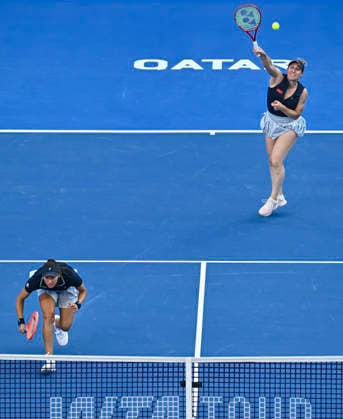 WTA, Tennis Damen QATAR OPEN 2026-DOUBLES SEMIFINAL Gabriela Dabrowski (top) of Canada and Luisa Stefani of Brazil seen in action during their Women s doubles semifinal match against Anna Danilina of Kazakhstan and Aleksandra Krunic of Serbia at the WTA Qatar TotalEnergies Open 2026 tennis tournament at the Khalifa International Tennis Complex in Doha, Qatar, on February 13, 2026. ¨¨ DOHA Qatar Copyright: xNOUSHADx