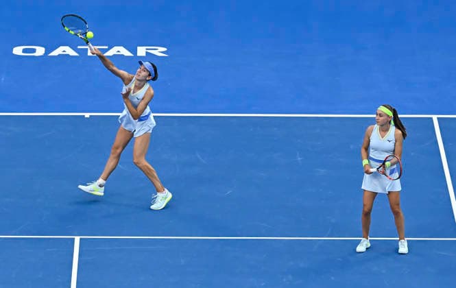 WTA, Tennis Damen QATAR OPEN 2026-DOUBLES SEMIFINAL Anna Danilina of Kazakhstan and Aleksandra Krunic of Serbia seen in action during their Women s doubles semifinal match against Gabriela Dabrowski of Canada and Luisa Stefani of Brazil at the WTA Qatar TotalEnergies Open 2026 tennis tournament at the Khalifa International Tennis Complex in Doha, Qatar, on February 13, 2026. ¨¨¨ DOHA Qatar Copyright: xNOUSHADx