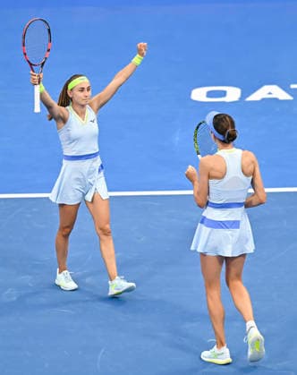 WTA, Tennis Damen QATAR OPEN 2026-DOUBLES SEMIFINAL Anna Danilina of Kazakhstan and Aleksandra Krunic of Serbia celebrate after winning their Women s doubles semifinal match against Gabriela Dabrowski of Canada and Luisa Stefani of Brazil at the WTA Qatar TotalEnergies Open 2026 tennis tournament at the Khalifa International Tennis Complex in Doha, Qatar, on February 13, 2026. ¨¨¨ DOHA Qatar Copyright: xNOUSHADx