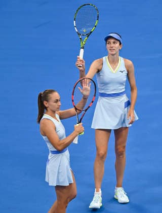WTA, Tennis Damen QATAR OPEN 2026-DOUBLES SEMIFINAL Anna Danilina of Kazakhstan and Aleksandra Krunic of Serbia celebrate after winning their Women s doubles semifinal match against Gabriela Dabrowski of Canada and Luisa Stefani of Brazil at the WTA Qatar TotalEnergies Open 2026 tennis tournament at the Khalifa International Tennis Complex in Doha, Qatar, on February 13, 2026. ¨¨¨ DOHA Qatar Copyright: xNOUSHADx