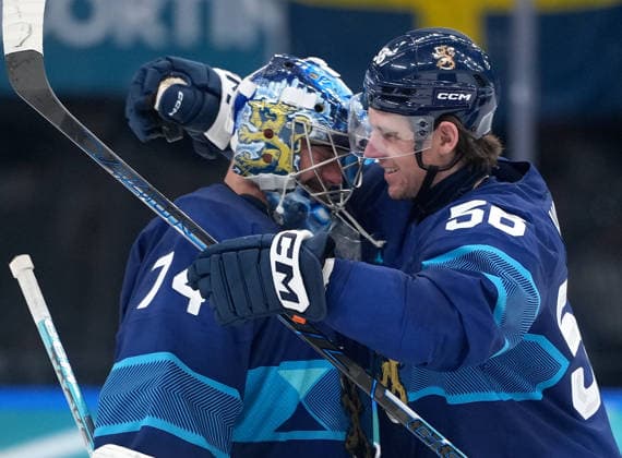 (260213) -- MILAN, Feb. 13, 2026 -- Erik Haula (R) of Finland celebrates with teammate Juuse Saros during the Ice hockey, Eishockey men s preliminary round group B match between Finland and Sweden at the Milan-Cortina 2026 Olympic Winter games, Winterspiele,Spiele, Summer games in Milan, Italy, Feb. 13, 2026. ) (MICO2026)ITALY-MILAN-OLYMPIC WINTER GAMES-ICE HOCKEY-MEN-PRELIMINARY-FIN VS SWE TaoxXiyi 