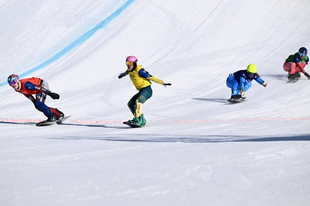 2026 WINTER Olympic Games, Olympische Spiele, Olympia, OS Josie Baff of Australia (centre) leads Eva Adamczykova of Czechia (left) to win the Gold medal in the big final of the Women™s Snowboard Cross Final at the Livigno Snow Park on day 7 of the 2026 Milano Cortina Winter Olympic Games in Livigno, Italy, Wednesday, February 11, 2026. ( NO ARCHIVING, EDITORIAL USE ONLY LIVIGNO SONDRIO ITALY  Copyright: xDANxHIMBRECHTSx 20260214166623897184
