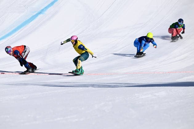 2026 WINTER Olympic Games, Olympische Spiele, Olympia, OS Josie Baff of Australia (centre) leads Eva Adamczykova of Czechia (left) to win the Gold medal in the big final of the Women™s Snowboard Cross Final at the Livigno Snow Park on day 7 of the 2026 Milano Cortina Winter Olympic Games in Livigno, Italy, Wednesday, February 11, 2026. ( NO ARCHIVING, EDITORIAL USE ONLY LIVIGNO SONDRIO ITALY  Copyright: xDANxHIMBRECHTSx 20260214131399249650