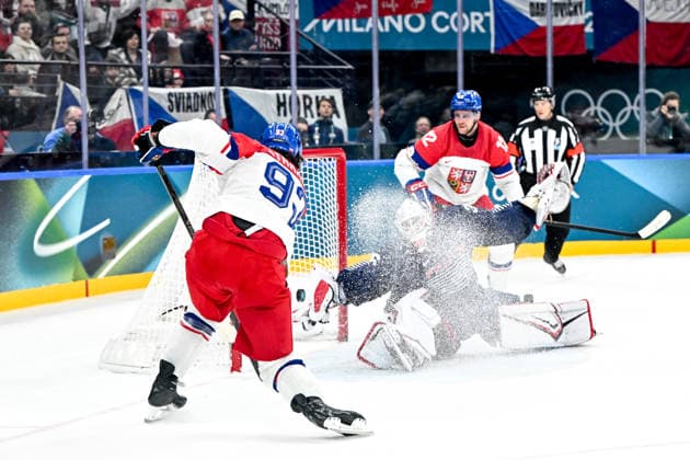 MILAN, ITALY - FEBRUARY 13: Matej Stransky of Czechia scores a goal against goalkeeper Martin Neckar of France during the Men™s Prelim Round match between France and Czech Republic on day seven of the Milano Cortina 2026 Winter Olympic Games, Olympische Spiele, Olympia, OS at Milano Santagiulia IHO Arena on February 13, 2026 in Milan, Italy. Milan Milano Santagiulia IHO Arena Italy *** MILAN, ITALY FEBRUARY 13 Matej Stransky of Czechia scores a goal against goalkeeper Martin Neckar of France during the Men™s Prelim Round match between France and Czech Republic on day seven of the Milano Cortina 2026 Winter Olympic games at Milano Santagiulia IHO Arena on February 13, 2026 in Milan, Italy Milan Milano Santagiulia IHO Arena Italy Copyright: xJustPictures.ch AndreaxBrancax jp-en-EuSpIm-AB-AAB_439613022026