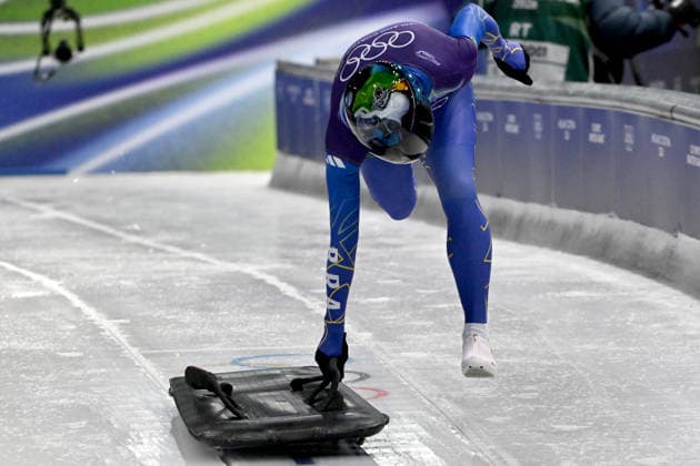 Cortina d Ampezzo, Italy, February 13th 2026. Nicole Rocha Silveira of Brazil in action during the Skeleton Women’s heat 1 and 2 races of the Olympic Winter games, Winterspiele,Spiele, Summer games 2026 in Cortina d Ampezzo, Italy. (Photo by Igor Kupljenik Sports Press Photo)  Copyright: xIgorxKupljenikx xSPPx Sportspressphoto_SPR92217