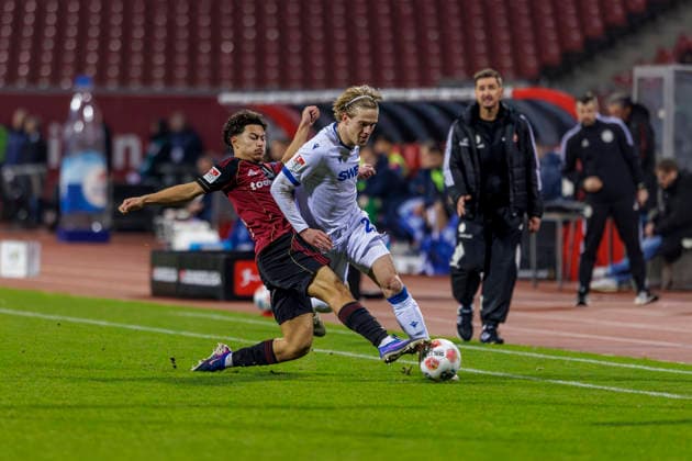 Nuremberg, Germany February 13, 2026 2 Liga 2025 2026 1 FC Nürnberg vs Karlsruher SC In the picture from left in a duel Justin von der Hitz FCN and David Herold KSC DFL regulations prohibit any use of photographs as image sequences and or quasi video Max Morlock Stadion Bayern Copyright: xFotostandx xSchäferx