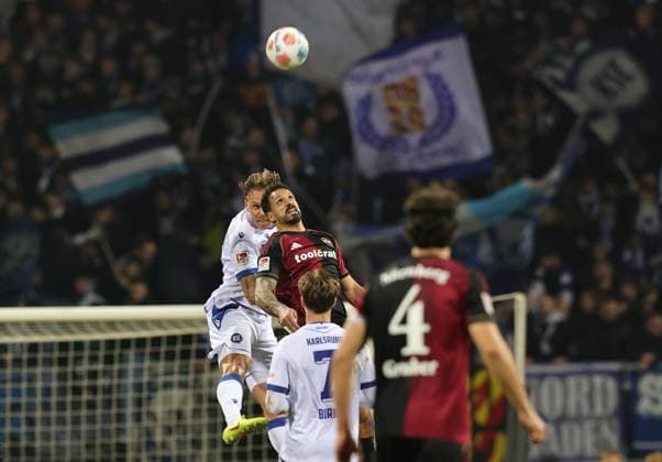 13 02 2026 Soccer Season 2025 2026 2 Soccer Bundesliga 22 Matchday 1 FC Nürnberg FCN Club Karlsruher SC KSC Sportfoto Zink DaMa xdaxmax DFL regulations prohibit any use of photographs as image sequences and or quasi video only for editorial use Marcel Franke 28, Karlsruher SC KSC in header duel with Adriano Grimaldi 33, 1 FC Nürnberg FCN