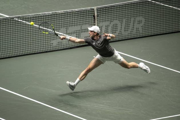 ROTTERDAM, NETHERLANDS - FEBRUARY 13: Botic van de Zandschulp of the Netherlands in action against Alex de Minaur of Australia during the Quarter-finals of the ABN AMRO Open at Rotterdam Ahoy on February 13, 2026 in Rotterdam, Netherlands. Credit: Andy Astfalck Netherlands Copyright: xAndyxAstfalckx