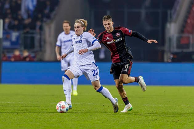 Nuremberg, Germany February 13, 2026 2 Liga 2025 2026 1 FC Nuremberg vs Karlsruher SC Pictured from left in duel David Herold KSC and Adam Markhiev FCN DFL regulations prohibit any use of photographs as image sequences and or quasi video Max Morlock Stadion Bayern Copyright: xFotostandx xSchäferx