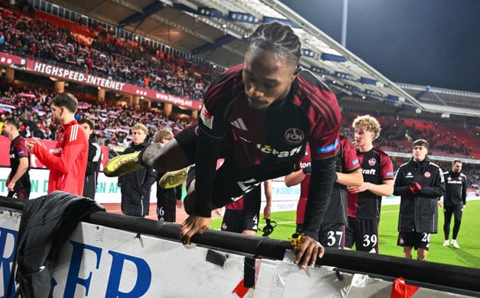 13 02 2026 Soccer Season 2025 2026 2 Soccer Bundesliga 22 Matchday 1 FC Nuremberg FCN Club Karlsruher SC KSC Sportfoto Zink xwoxzix DFL regulations prohibit any use of photographs as image sequences and or quasi video only for editorial use Mohamed Ali Zoma 23, 1 FC Nuremberg FCN jumps over the boards after the end of the match