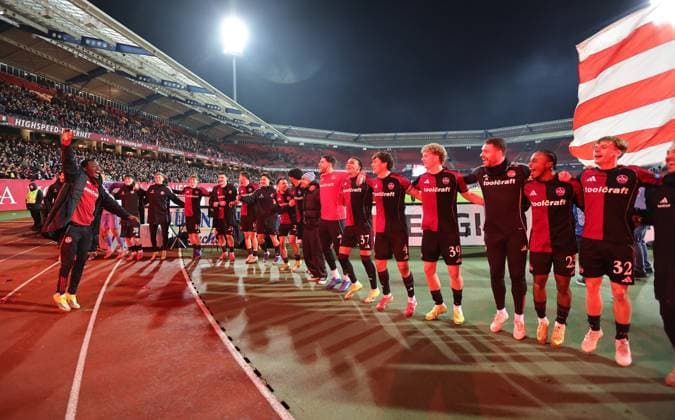 13 02 2026 Soccer Season 2025 2026 2 Soccer Bundesliga 22 Matchday 1 FC Nürnberg FCN Club Karlsruher SC KSC Sportfoto Zink DaMa xdaxmax DFL regulations prohibit any use of photographs as image sequences and or quasi video only for editorial use Jubel Freude nach Spielende Rabby Nzingoula 22, 1 FC Nürnberg FCN und Mannschaft Team des FCN celebrates with Clubfan Clubfans FCN Fans Fans